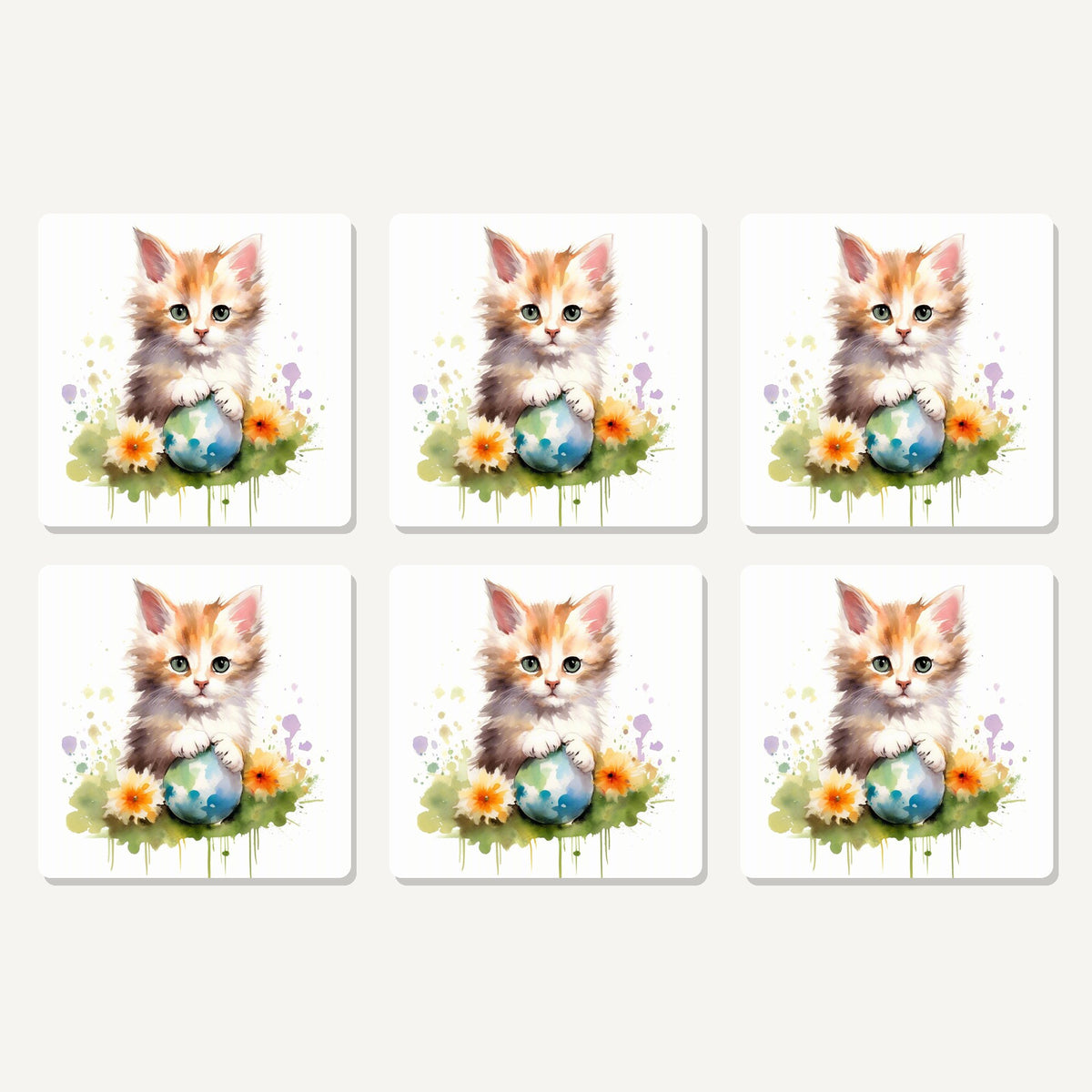 Flat lay of the ginger kitten with flowers & ball artwork on six square coasters