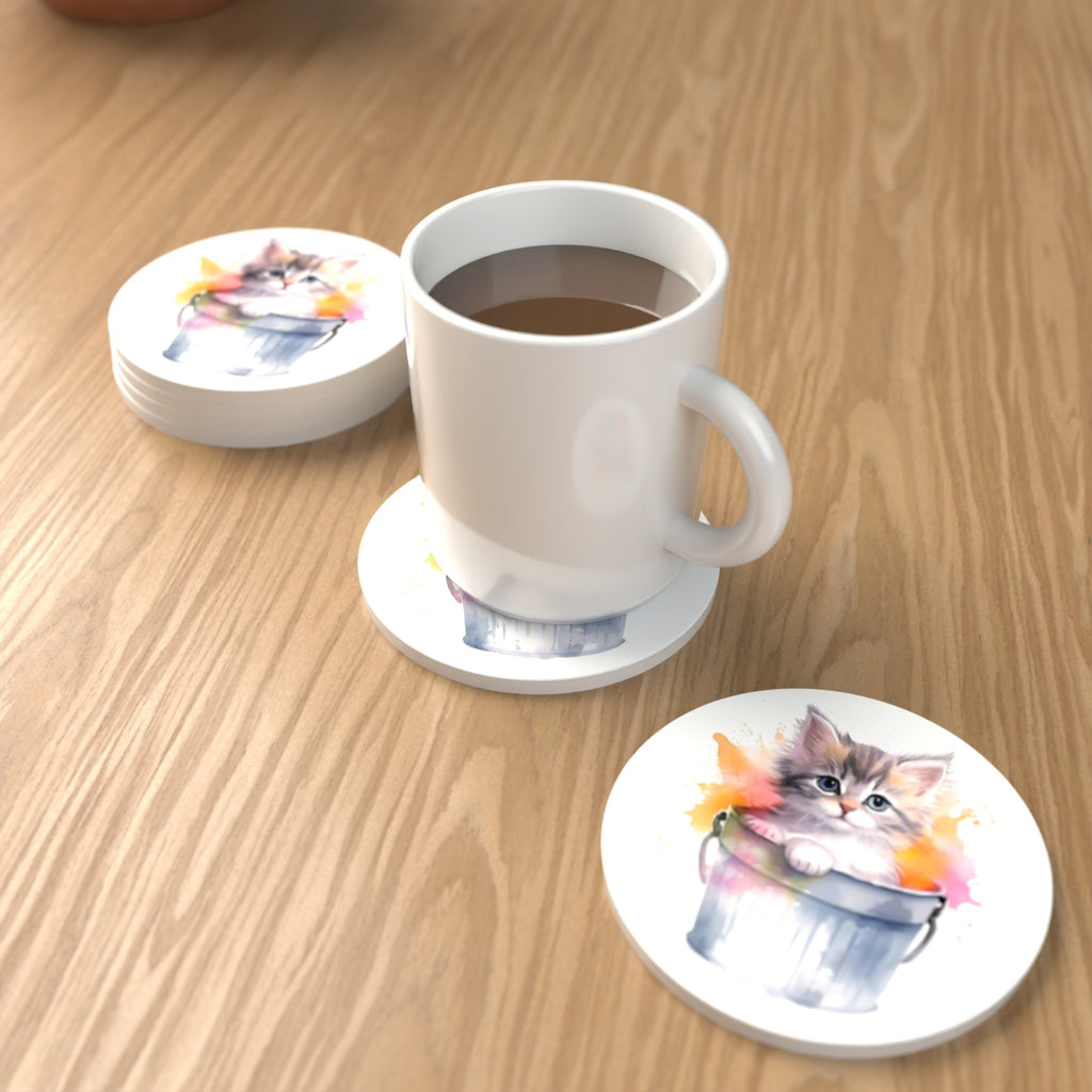 Kitten in a Tin Bucket Round Ceramic Coasters – Set of 6 – lifestyle mockup with a mug of coffee