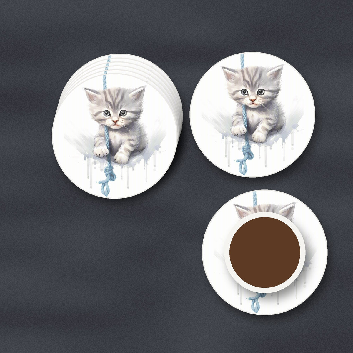 Grey Tabby Kitten on a Rope round ceramic coasters stacked on a slate kitchen worktop