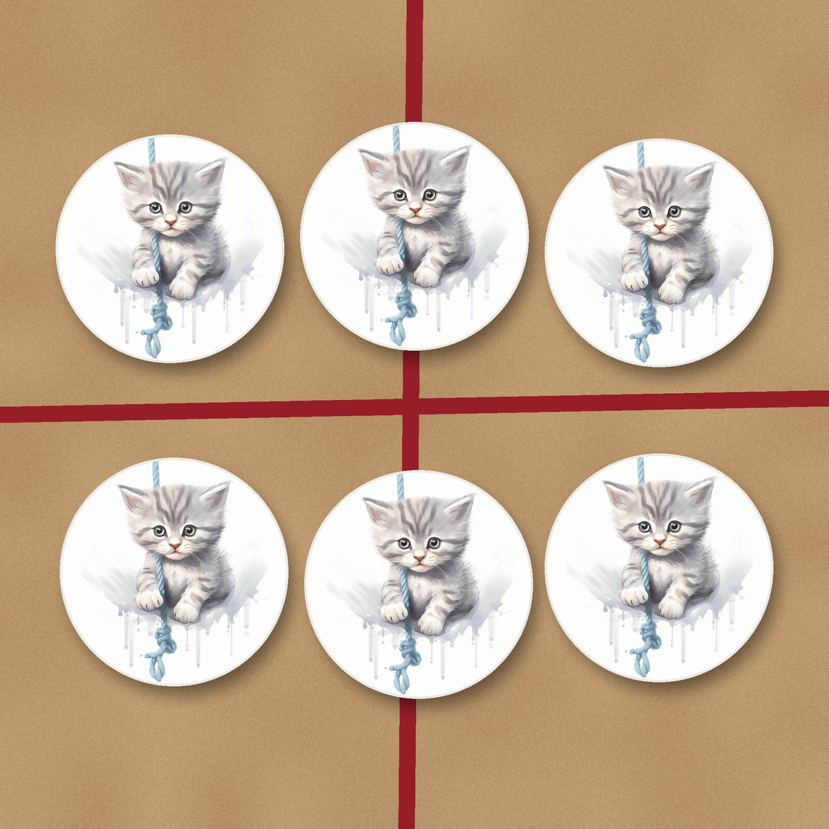 Grey Tabby Kitten on a Rope round ceramic coasters on kraft gift wrap