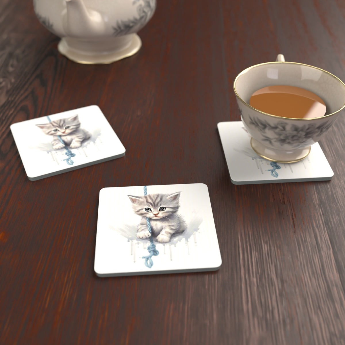 Grey Tabby Kitten on a Rope Square Glass Coasters – Set of 6 – lifestyle mockup with a teacup