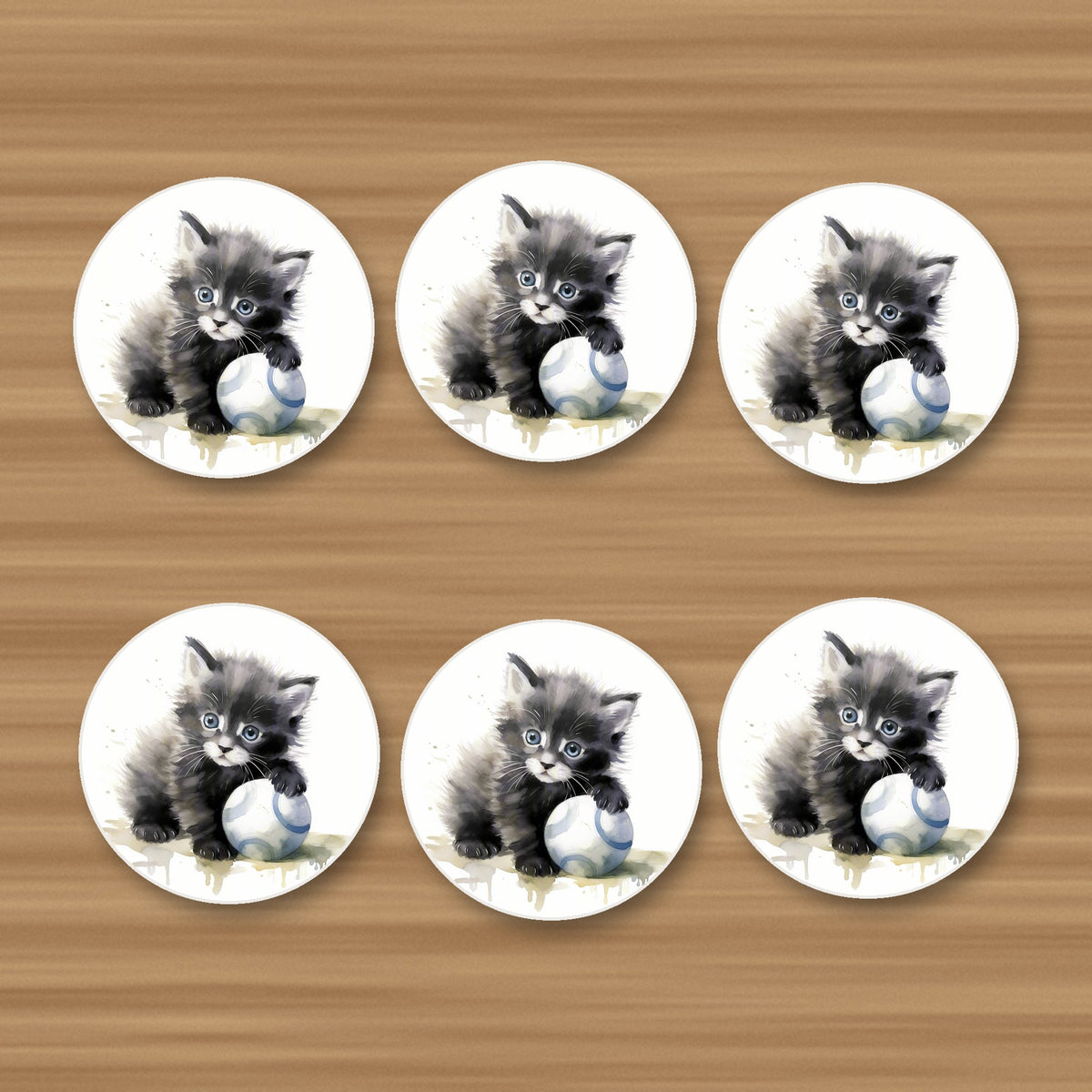 Black Kitten with a Ball round ceramic coasters, set of 6, on an oak coffee table