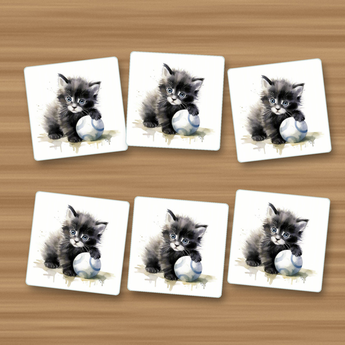 Black Kitten with a Ball square glass coasters, set of 6, on an oak coffee table