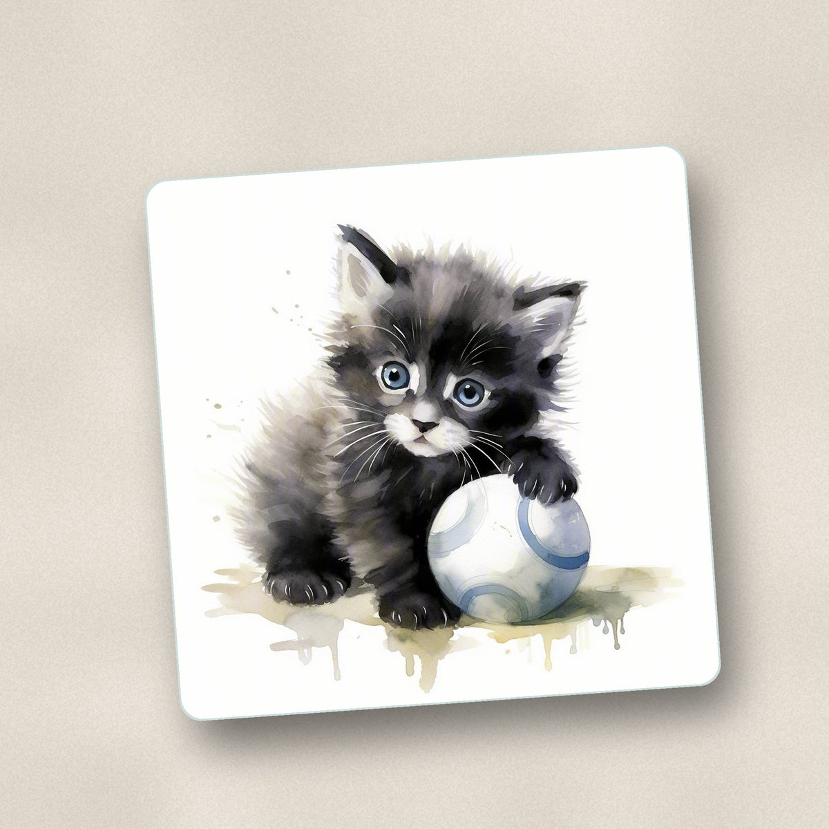 Close-up of one black kitten with a ball square glass coaster, flat UV print
