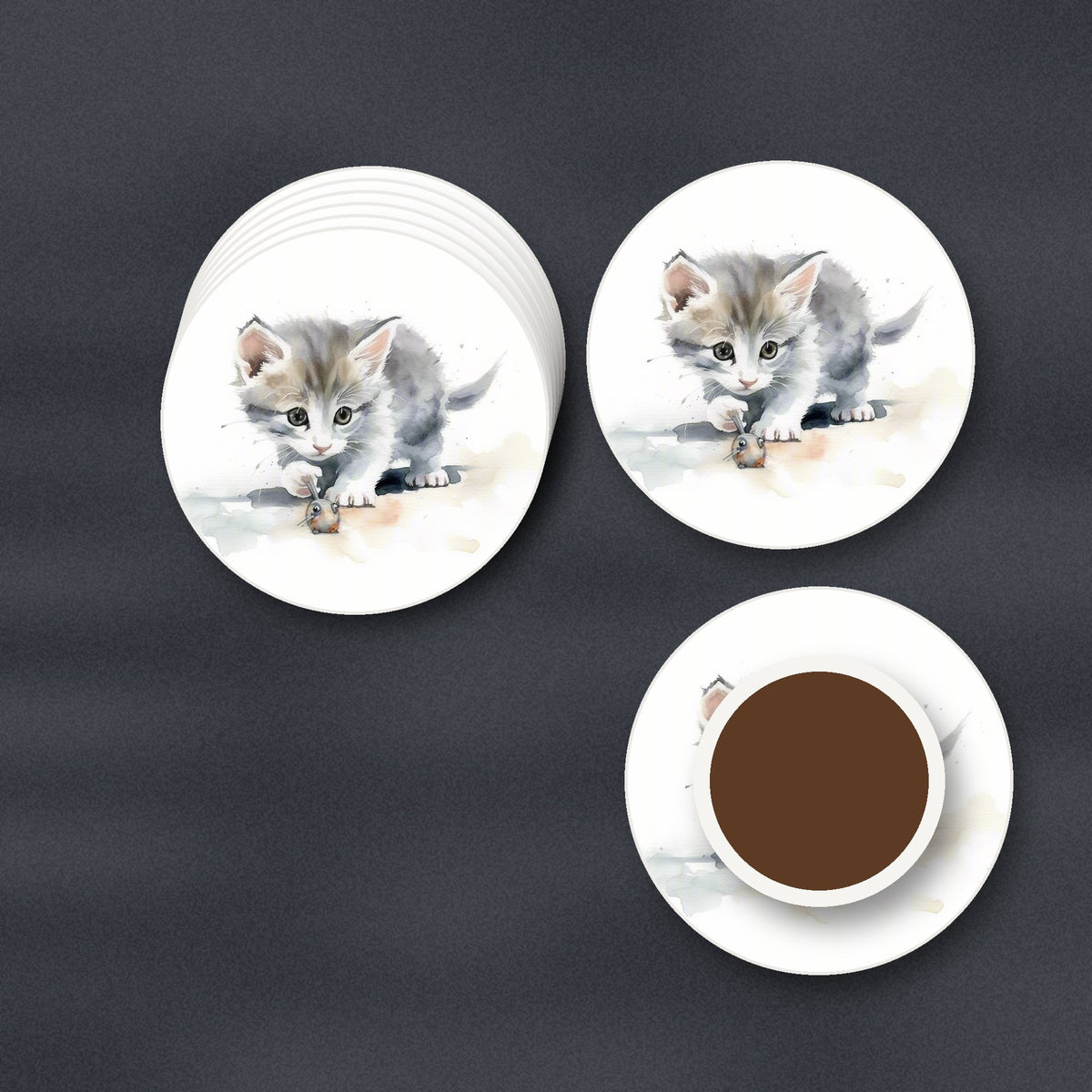 Grey Kitten at Play round ceramic coasters stacked on a slate kitchen worktop