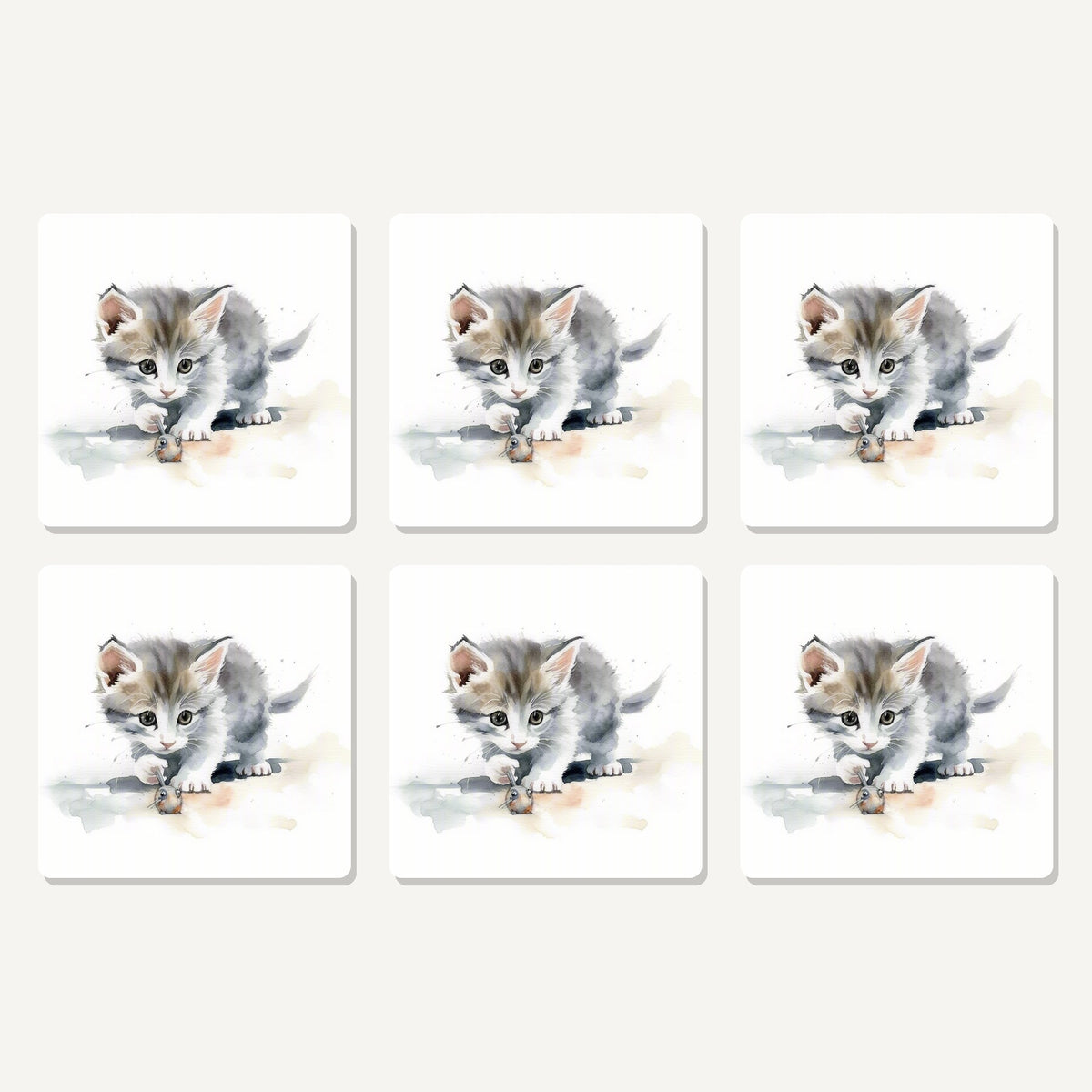 Flat lay of the grey kitten at play artwork on six square coasters