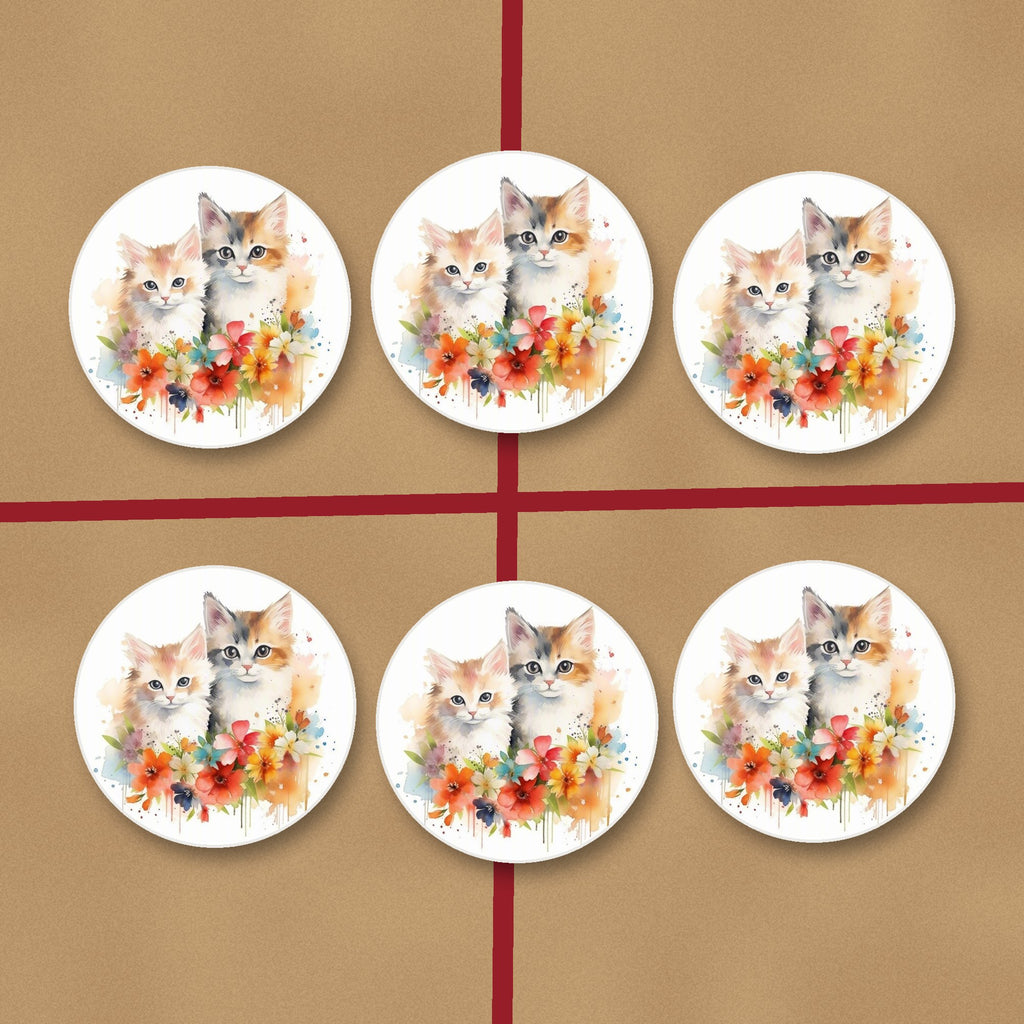 Two Kittens with Flowers round ceramic coasters on kraft gift wrap