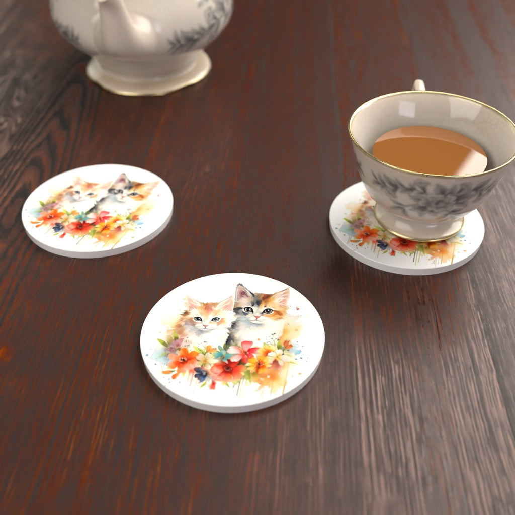 Two Kittens with Flowers Round Ceramic Coasters – Set of 6 – lifestyle mockup with a teacup