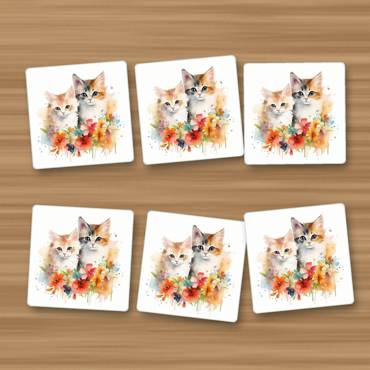 Two Kittens with Flowers square glass coasters, set of 6, on an oak coffee table