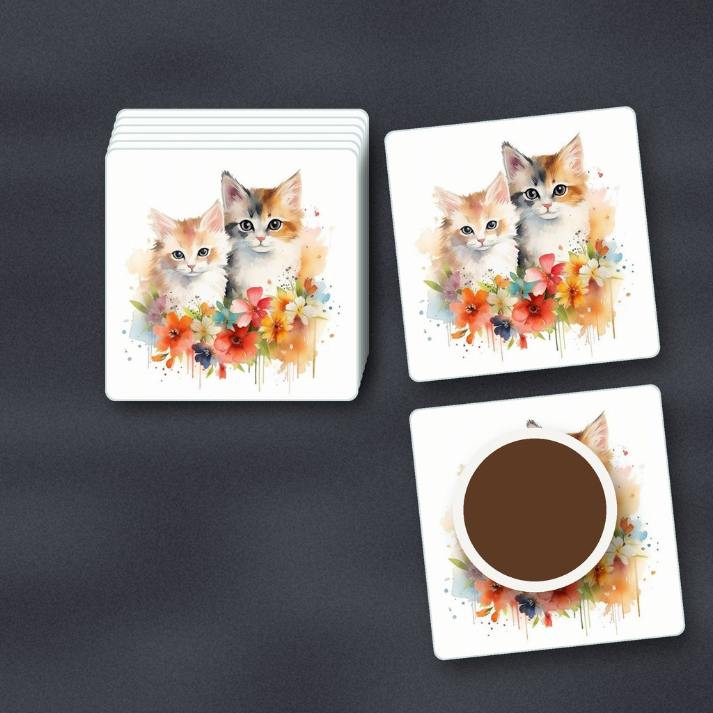 Two Kittens with Flowers square glass coasters stacked on a slate kitchen worktop
