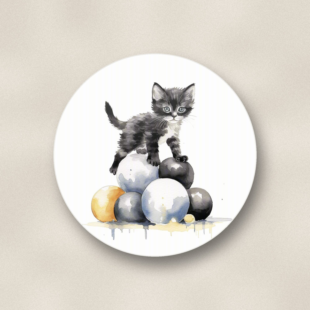 Close-up of one black kitten on a pile of balls round ceramic coaster, flat UV print