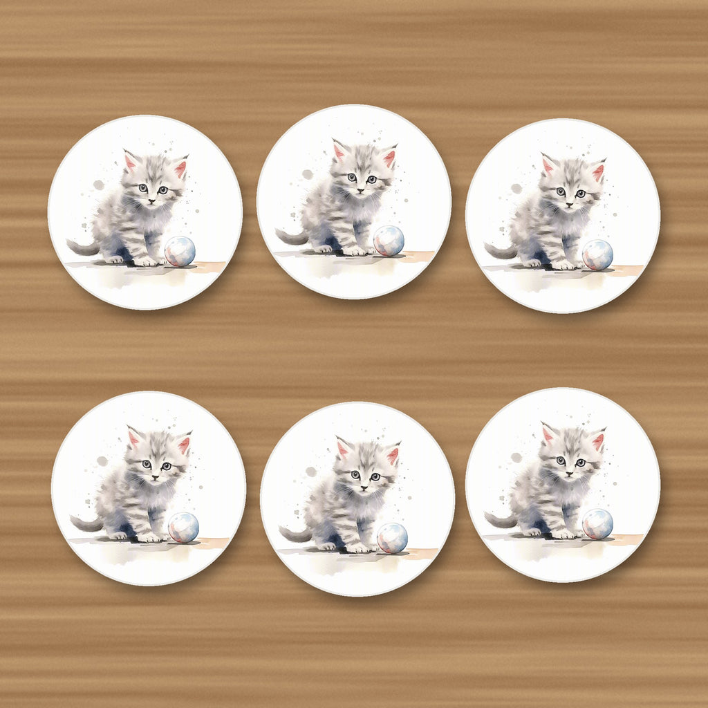 Grey Tabby Kitten with a Ball round ceramic coasters, set of 6, on an oak coffee table