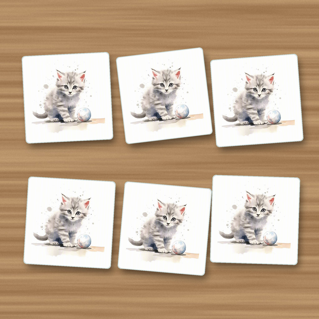 Grey Tabby Kitten with a Ball square glass coasters, set of 6, on an oak coffee table