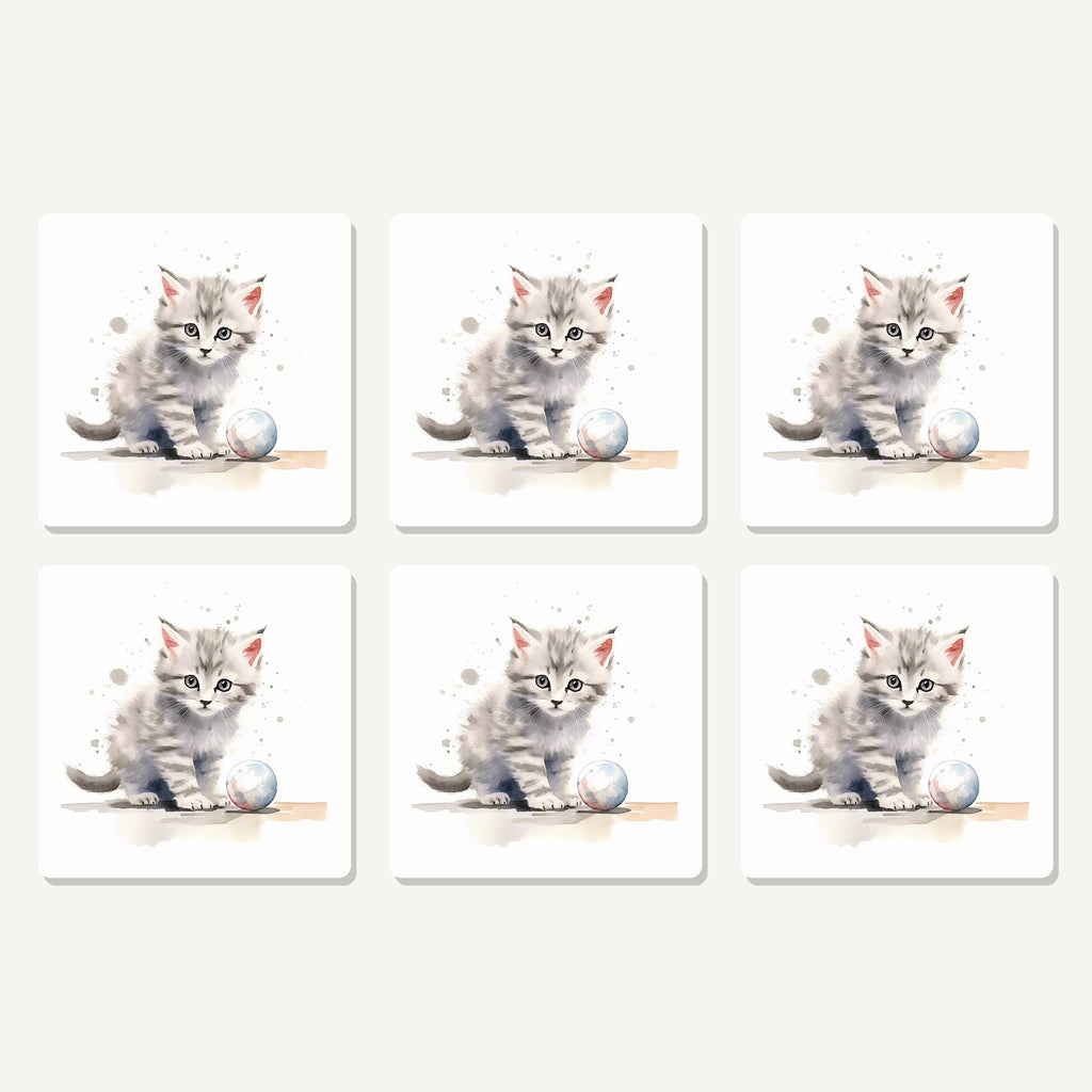 Flat lay of the grey tabby kitten with a ball artwork on six square coasters