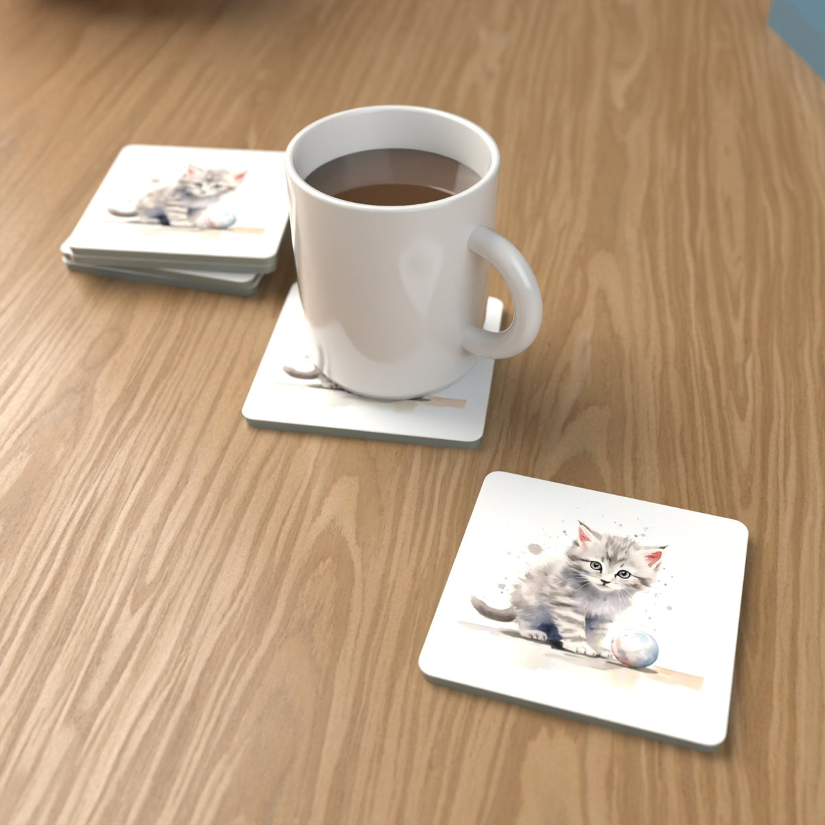 Grey Tabby Kitten with a Ball Square Glass Coasters – Set of 6 – lifestyle mockup with a mug of coffee