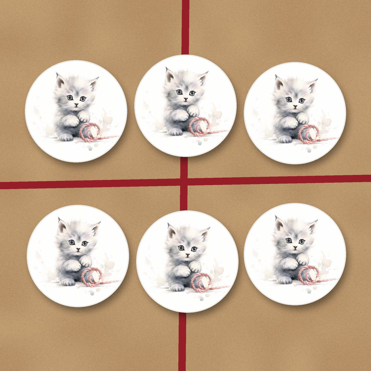 White Kitten with Yarn round ceramic coasters on kraft gift wrap