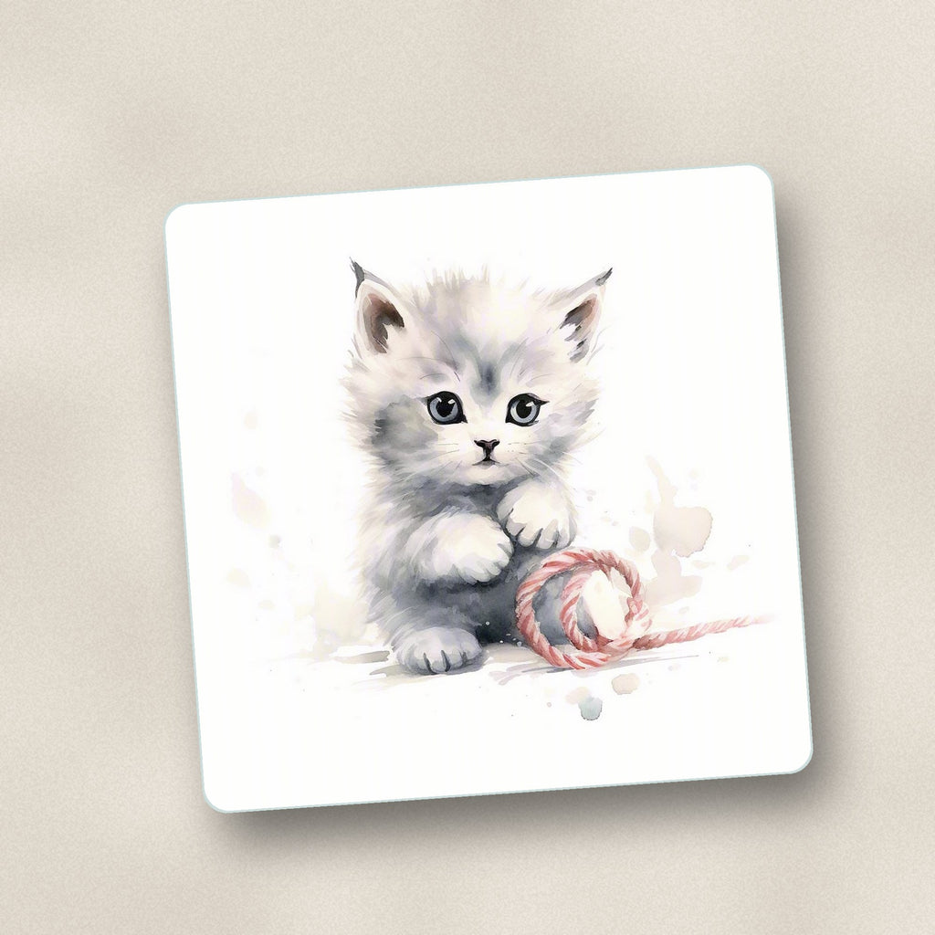 Close-up of one white kitten with yarn square glass coaster, flat UV print