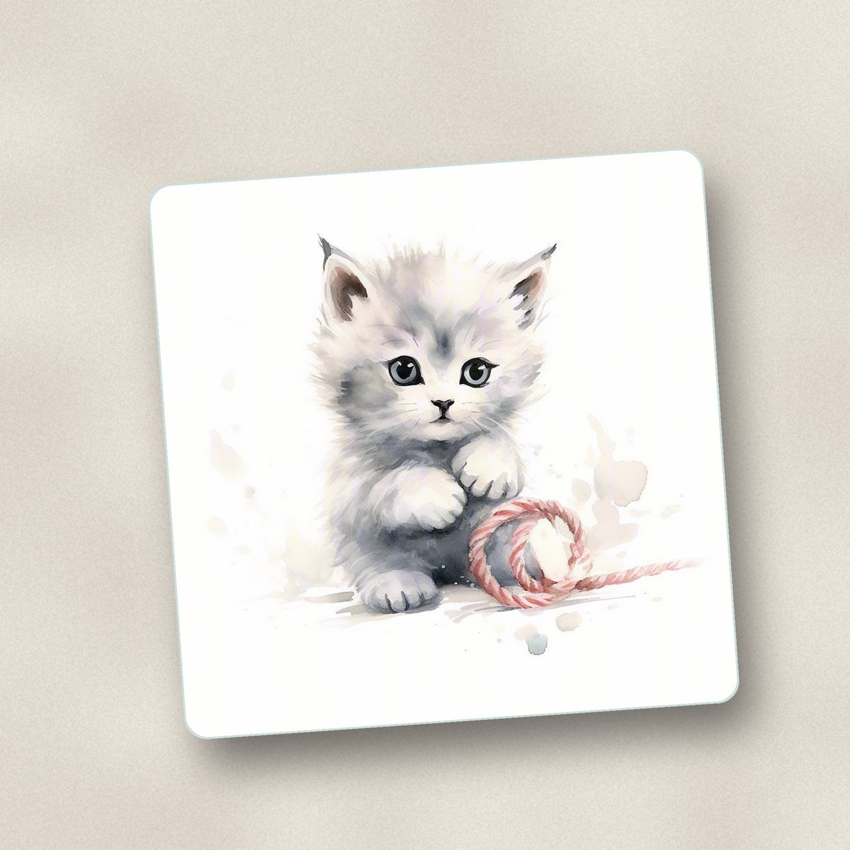 Close-up of one white kitten with yarn square glass coaster, flat UV print