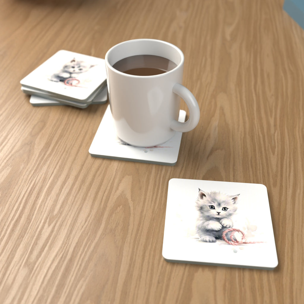 White Kitten with Yarn Square Glass Coasters – Set of 6 – lifestyle mockup with a mug of coffee