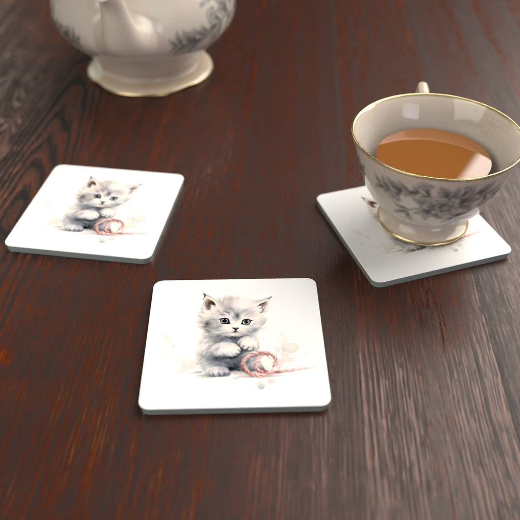 White Kitten with Yarn Square Glass Coasters – Set of 6 – lifestyle mockup with a teacup