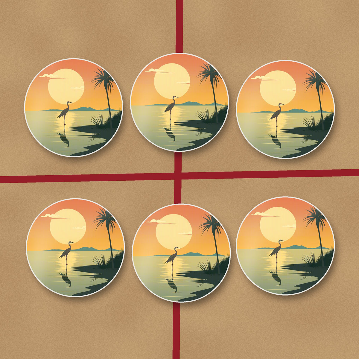 Heron at Sunset round ceramic coasters on kraft gift wrap