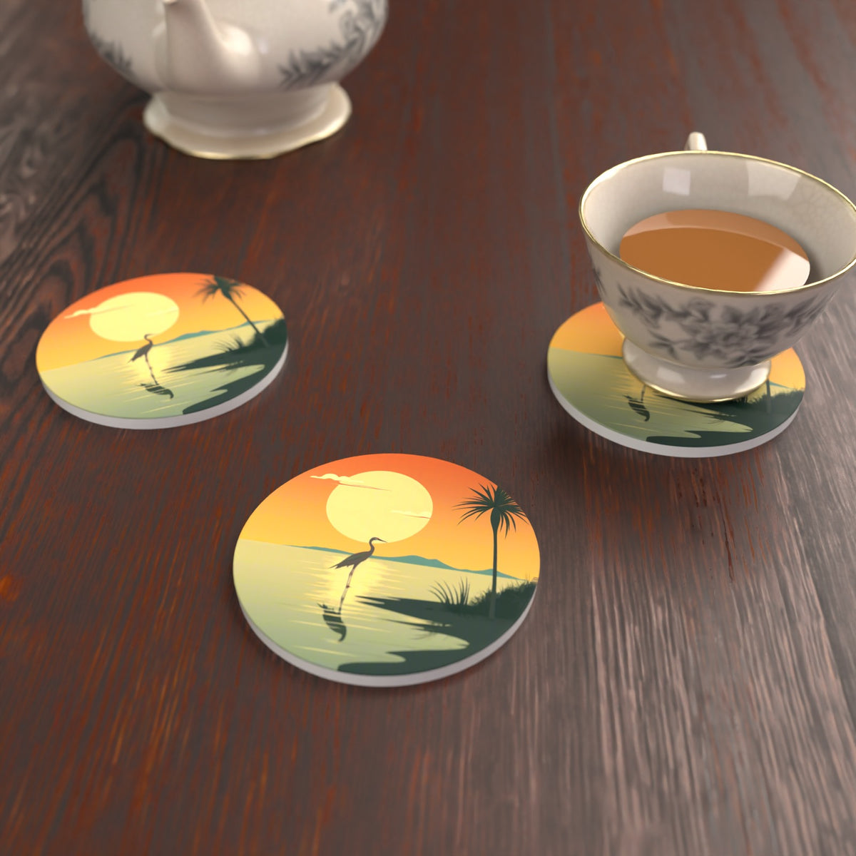 Heron at Sunset Round Ceramic Coasters – Set of 6 – lifestyle mockup with a teacup