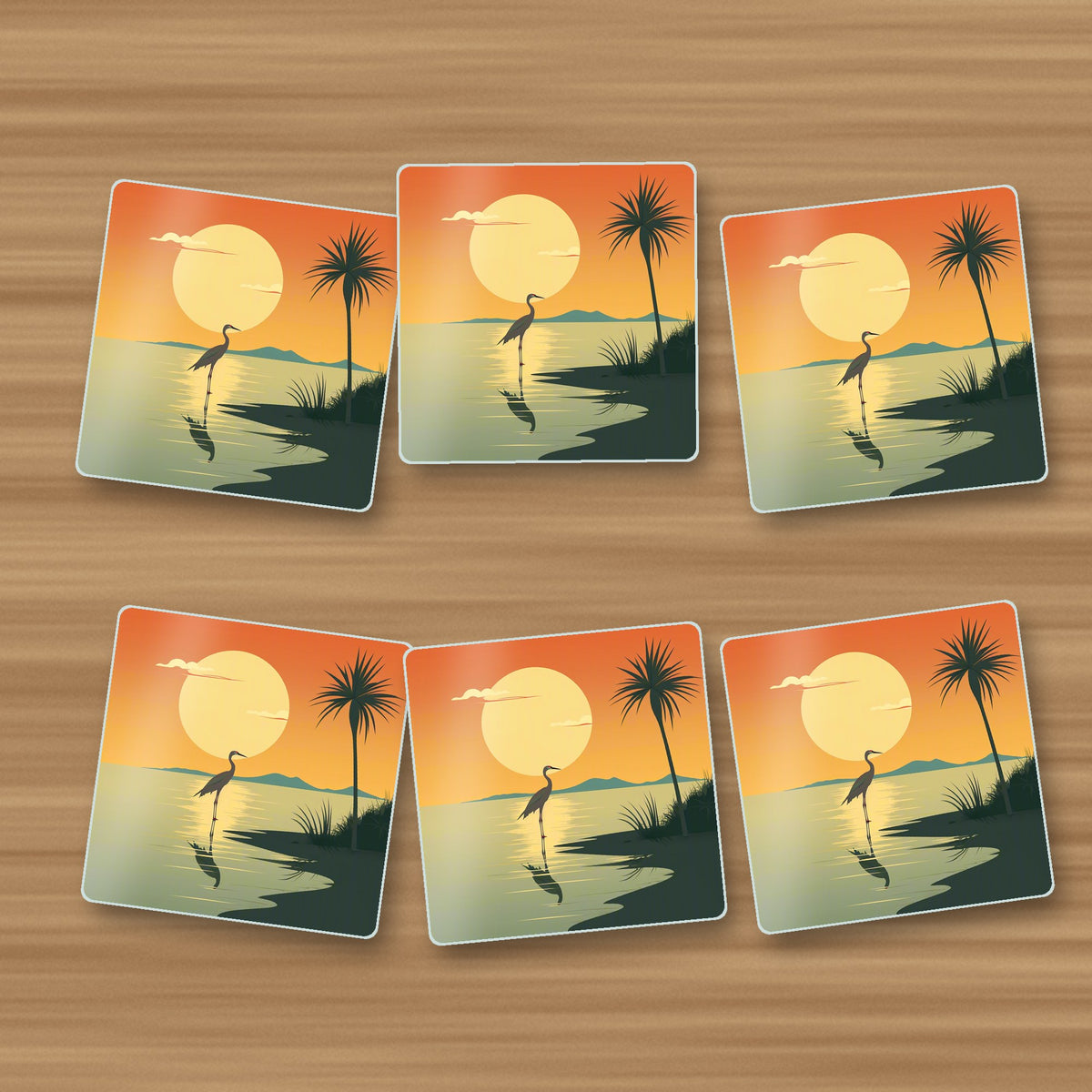 Heron at Sunset square glass coasters, set of 6, on an oak coffee table