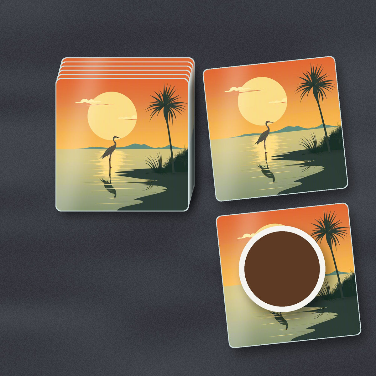 Heron at Sunset square glass coasters stacked on a slate kitchen worktop