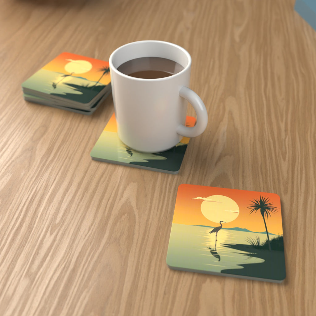 Heron at Sunset Square Glass Coasters – Set of 6 – lifestyle mockup with a mug of coffee