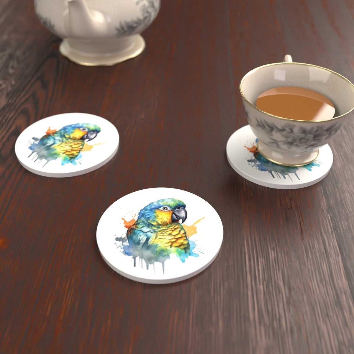 Watercolour Parrot Round Ceramic Coasters – Set of 6 – lifestyle mockup with a teacup