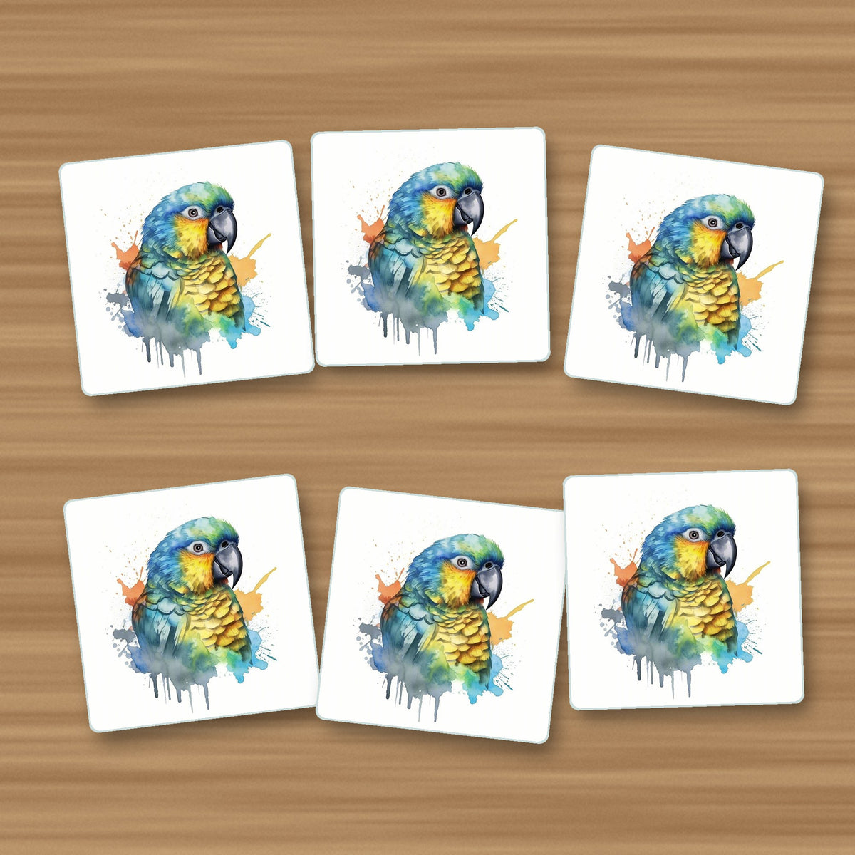 Watercolour Parrot square glass coasters, set of 6, on an oak coffee table