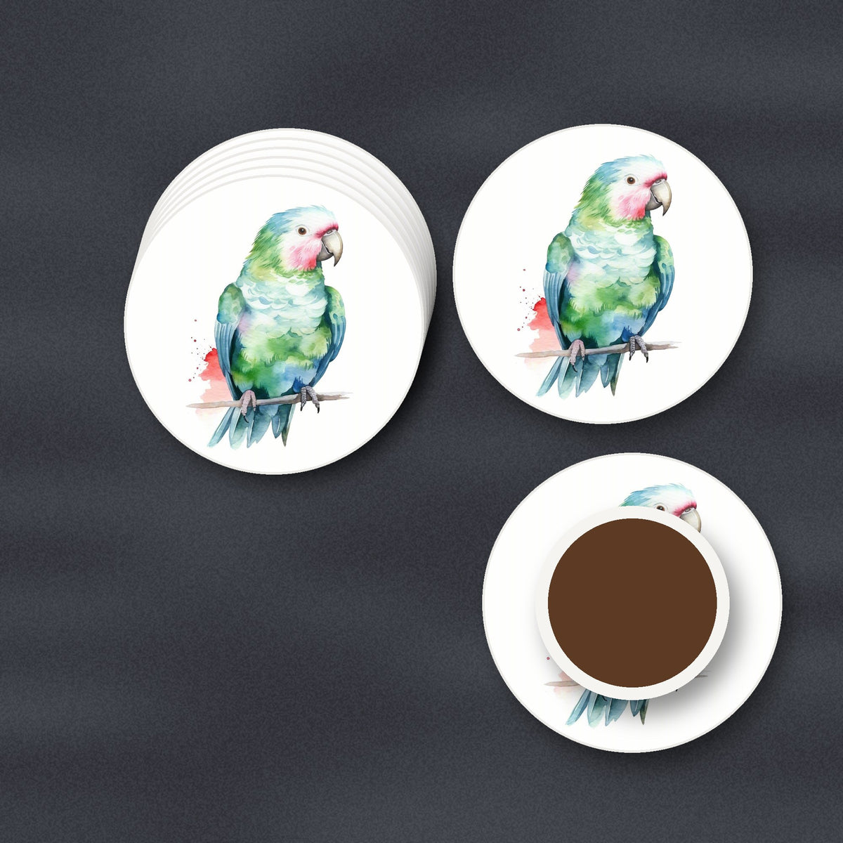 Watercolour Green Parrot on a Branch round ceramic coasters stacked on a slate kitchen worktop