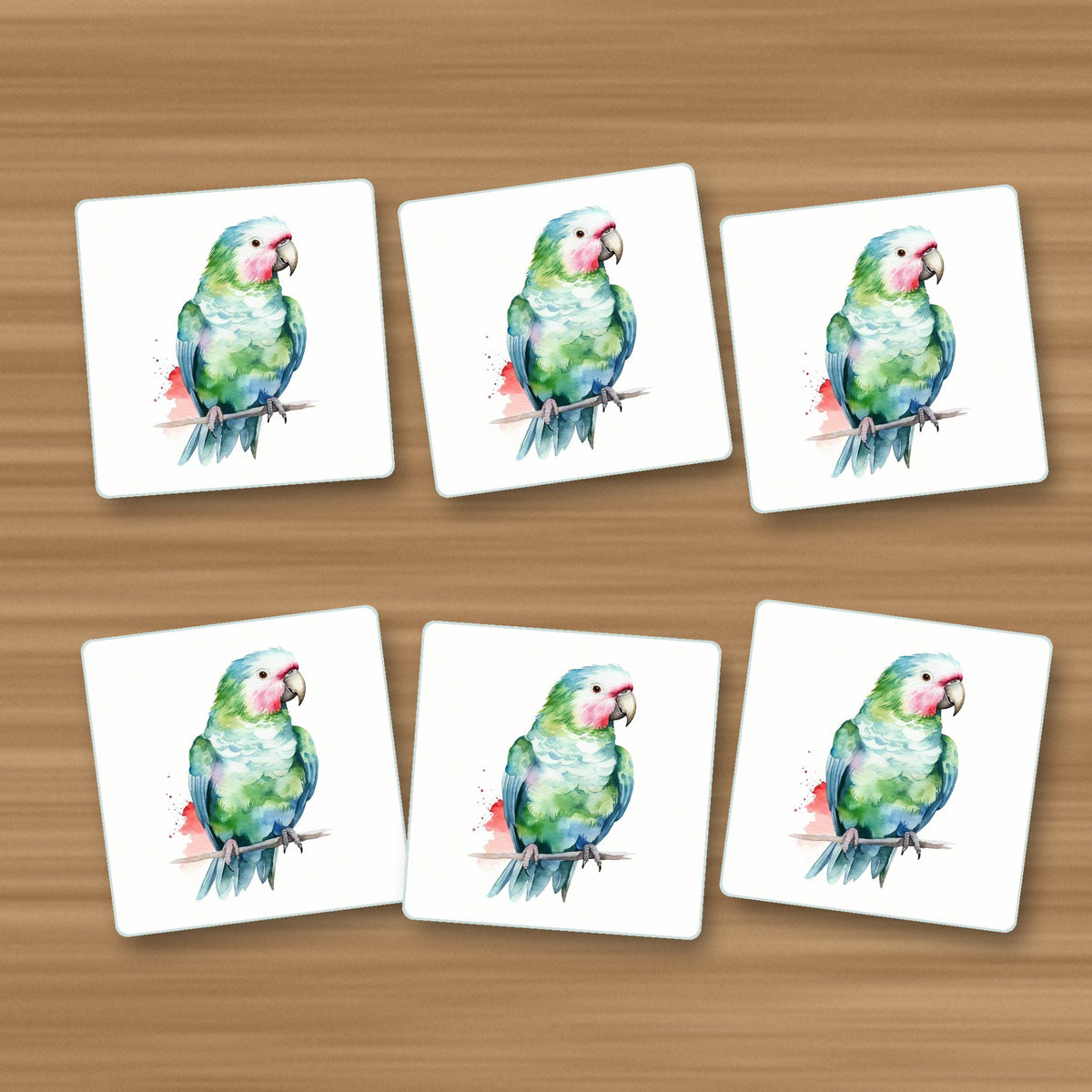 Watercolour Green Parrot on a Branch square glass coasters, set of 6, on an oak coffee table