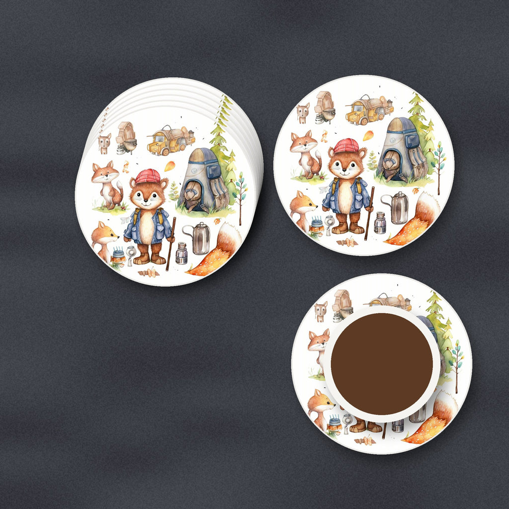 Woodland Fox Camping Adventure round ceramic coasters stacked on a slate kitchen worktop