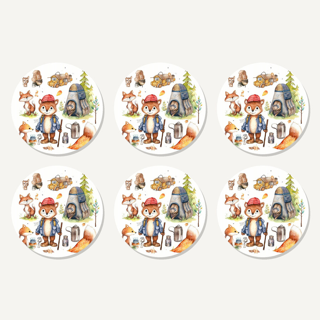 Flat lay of the woodland fox camping adventure artwork on six round coasters