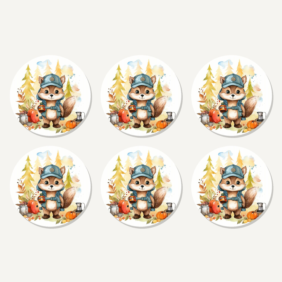 Flat lay of the squirrel camper artwork on six round coasters