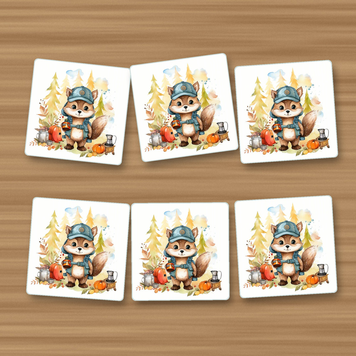 Squirrel Camper square glass coasters, set of 6, on an oak coffee table