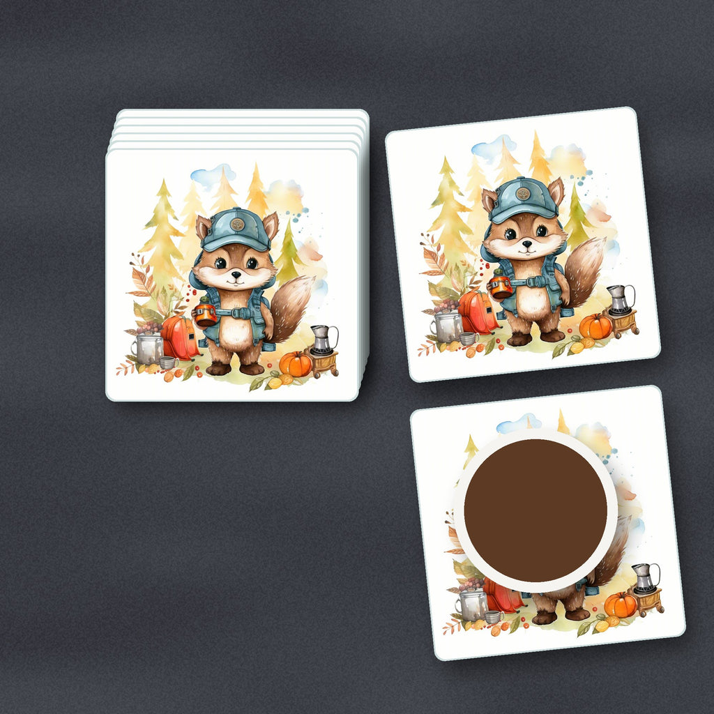 Squirrel Camper square glass coasters stacked on a slate kitchen worktop
