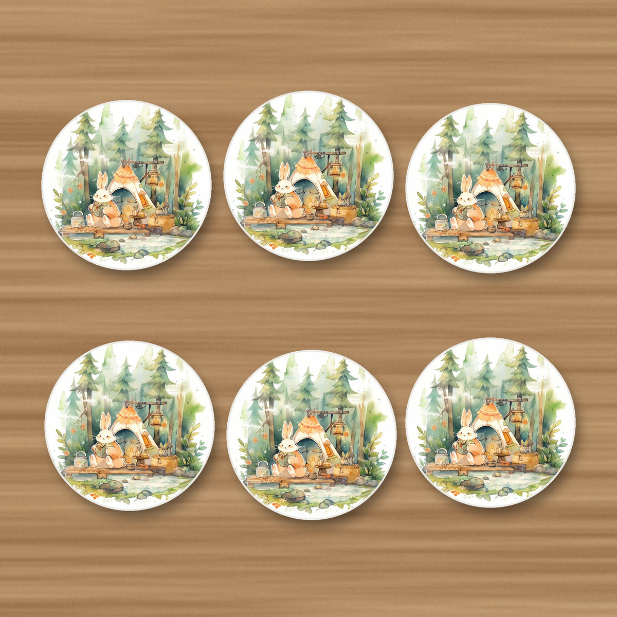 Rabbit Campsite in the Pines round ceramic coasters, set of 6, on an oak coffee table