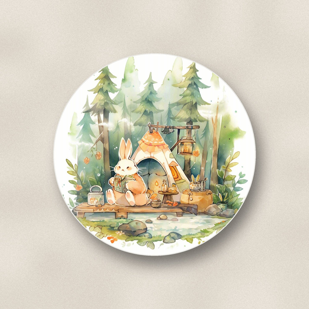 Close-up of one rabbit campsite in the pines round ceramic coaster, flat UV print