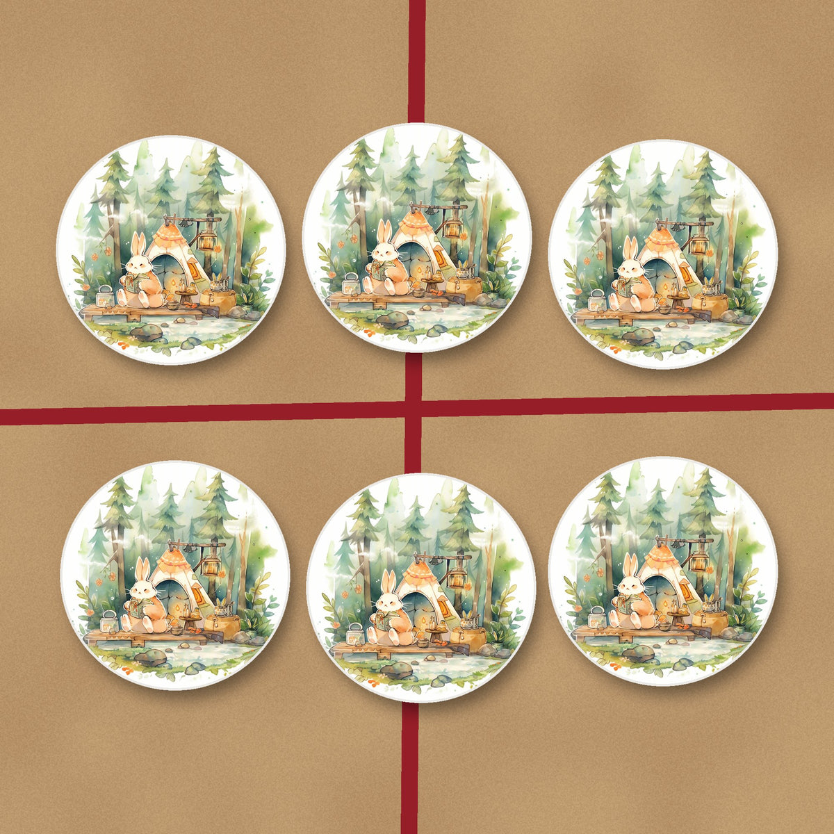 Rabbit Campsite in the Pines round ceramic coasters on kraft gift wrap