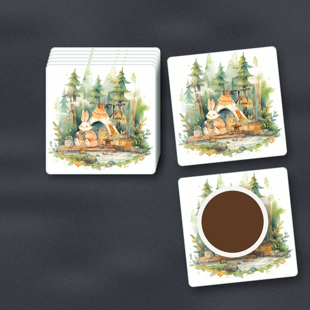 Rabbit Campsite in the Pines square glass coasters stacked on a slate kitchen worktop