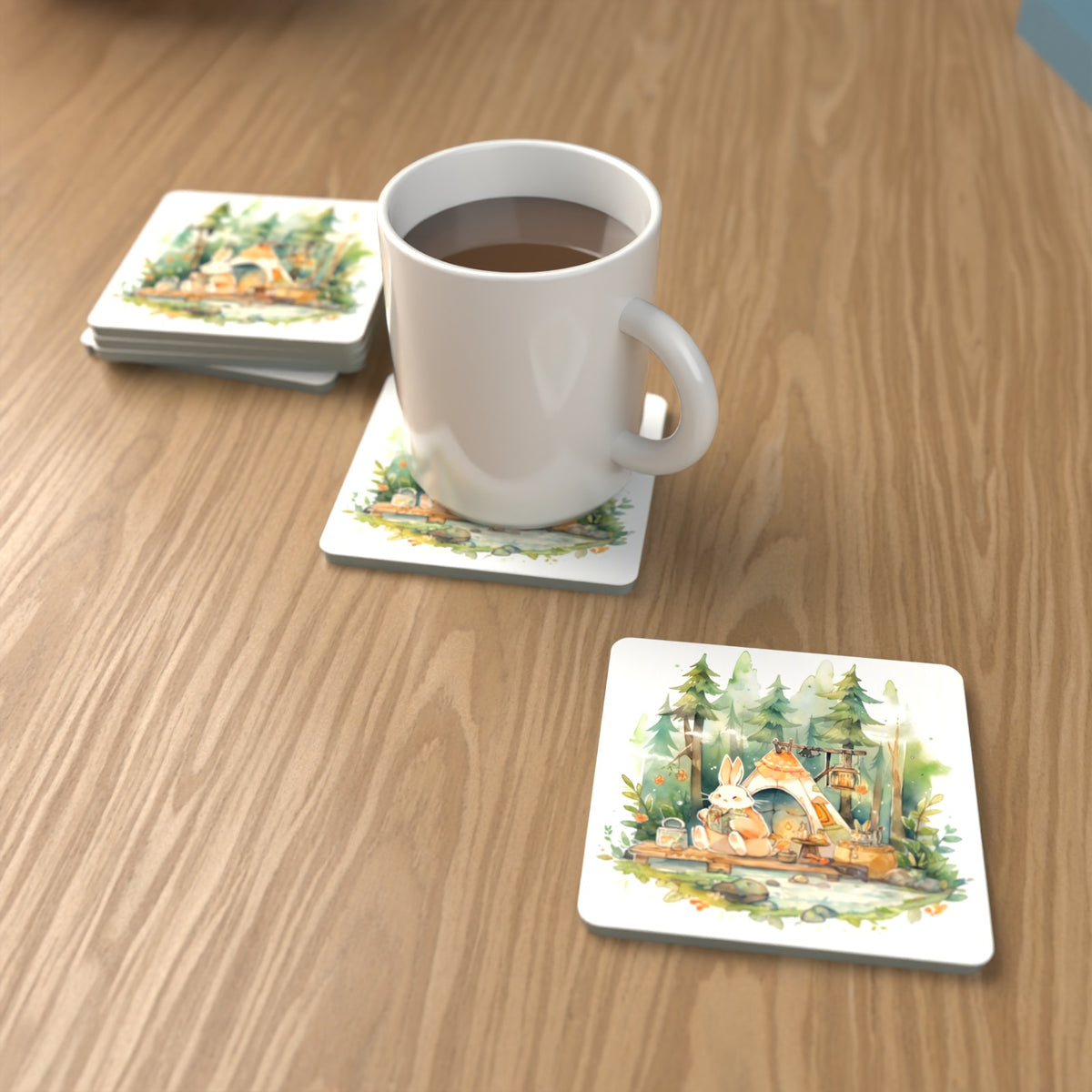 Rabbit Campsite in the Pines Square Glass Coasters – Set of 6 – lifestyle mockup with a mug of coffee