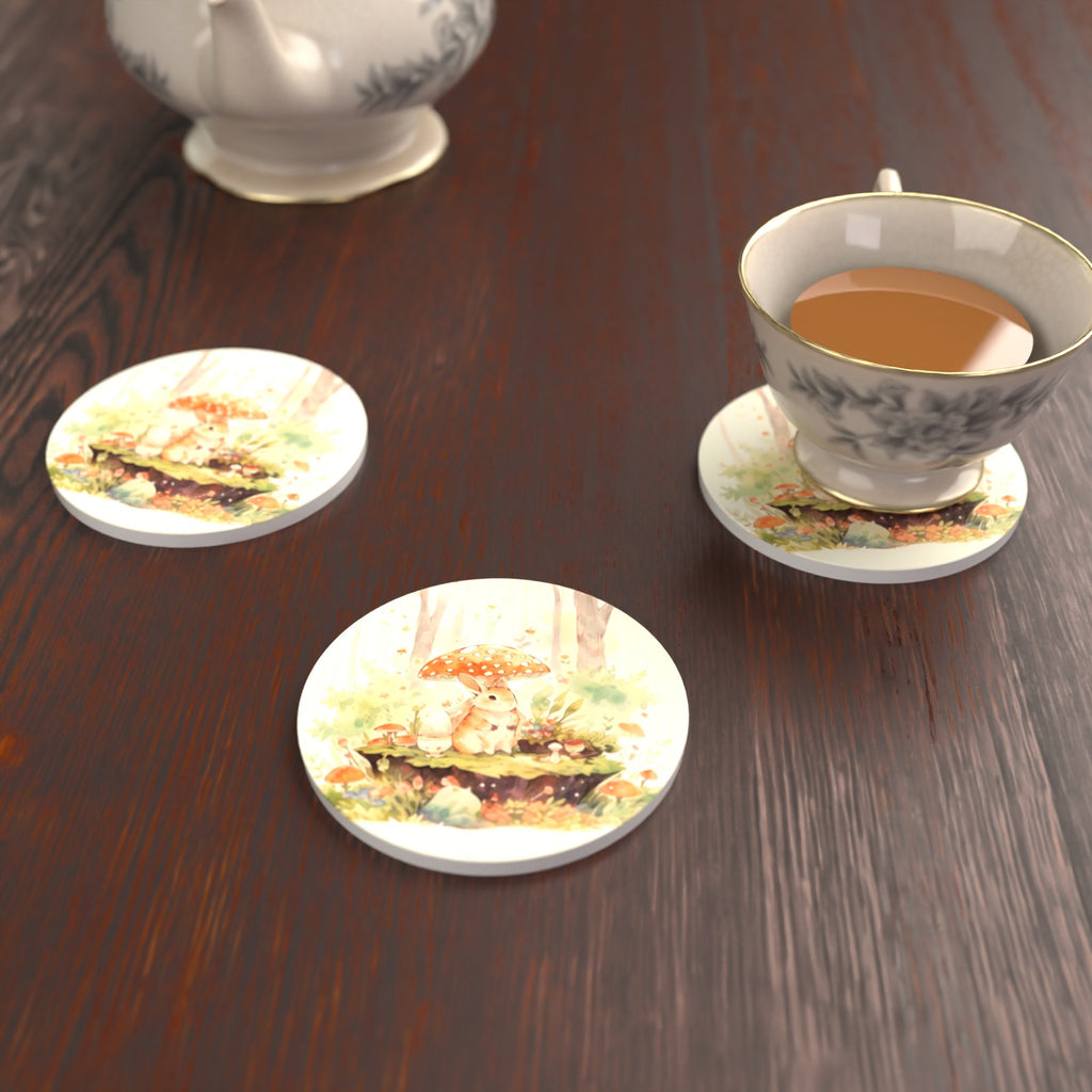 Rabbit under a Toadstool Round Ceramic Coasters – Set of 6 – lifestyle mockup with a teacup