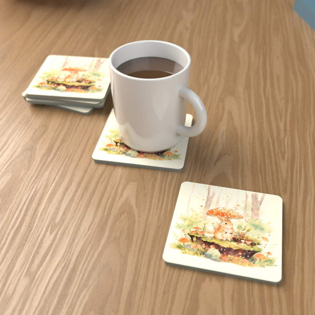 Rabbit under a Toadstool Square Glass Coasters – Set of 6 – lifestyle mockup with a mug of coffee