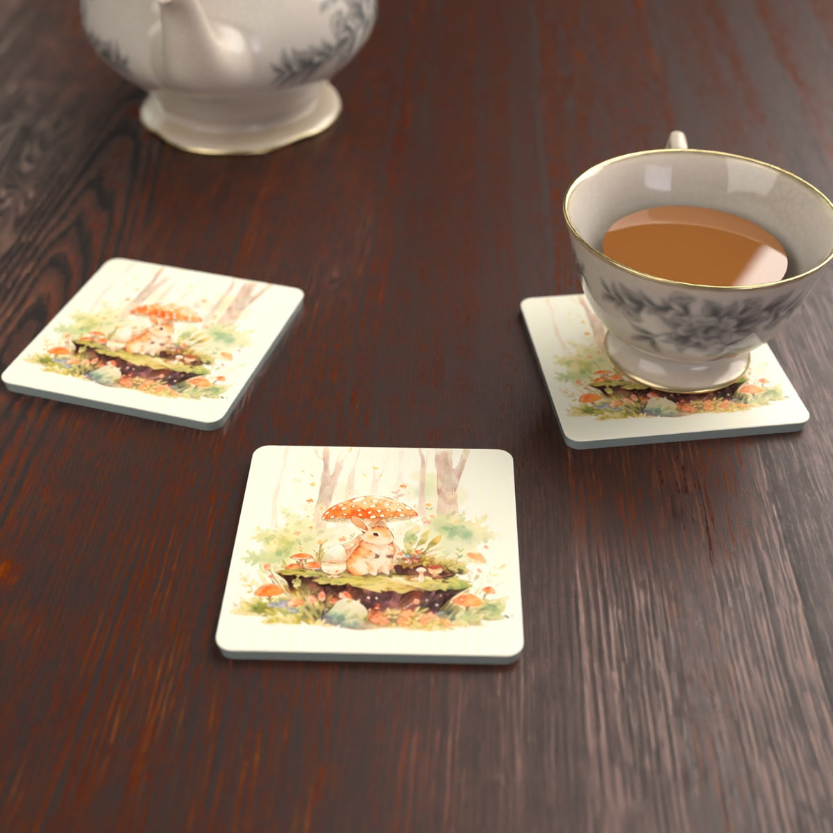 Rabbit under a Toadstool Square Glass Coasters – Set of 6 – lifestyle mockup with a teacup