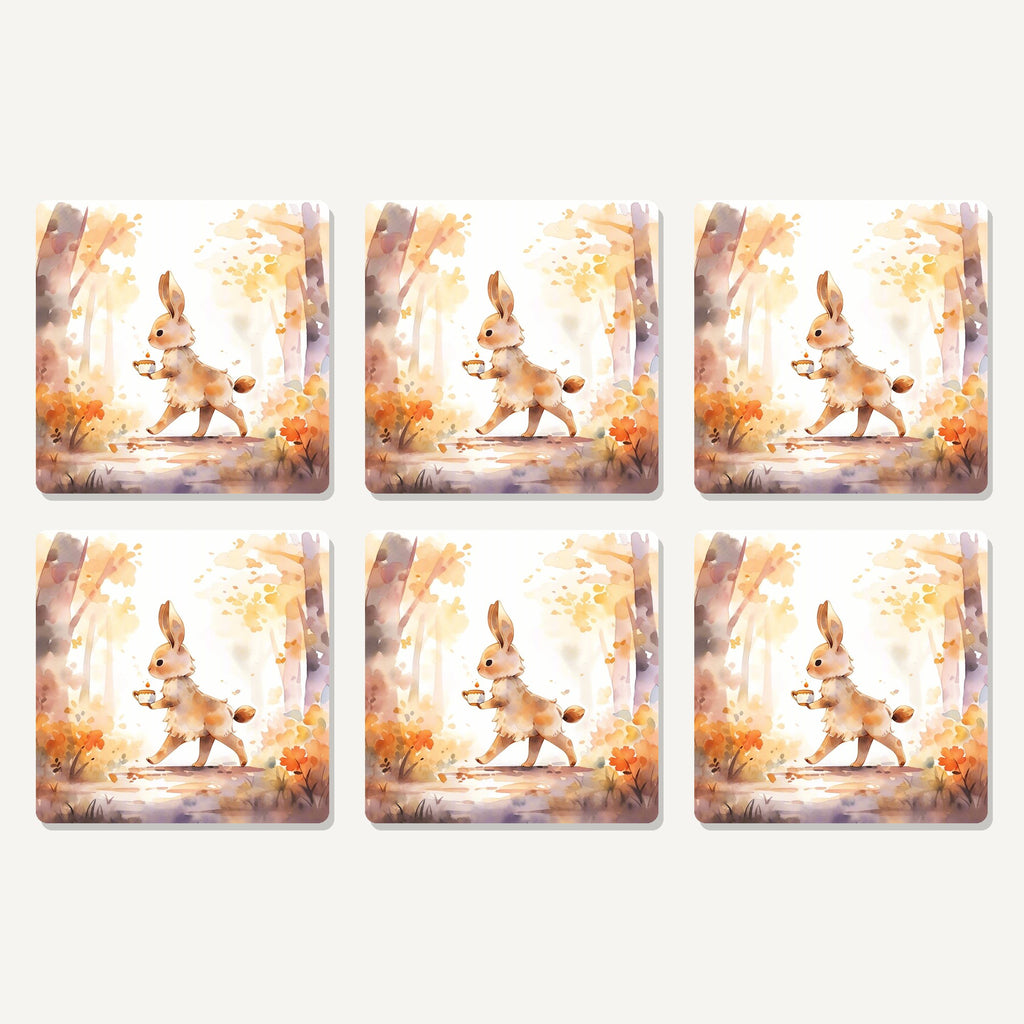 Flat lay of the rabbit on an autumn woodland path artwork on six square coasters
