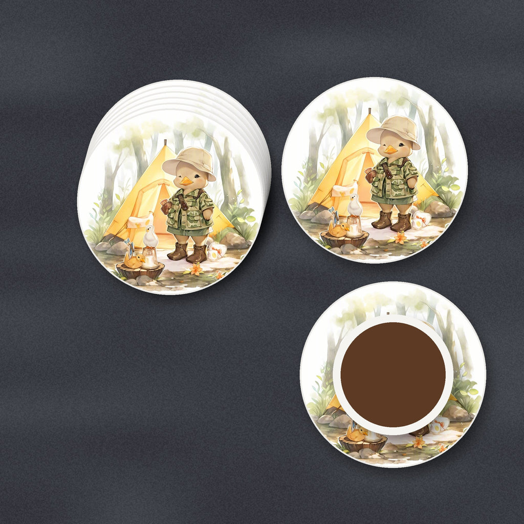 Duckling Camper round ceramic coasters stacked on a slate kitchen worktop