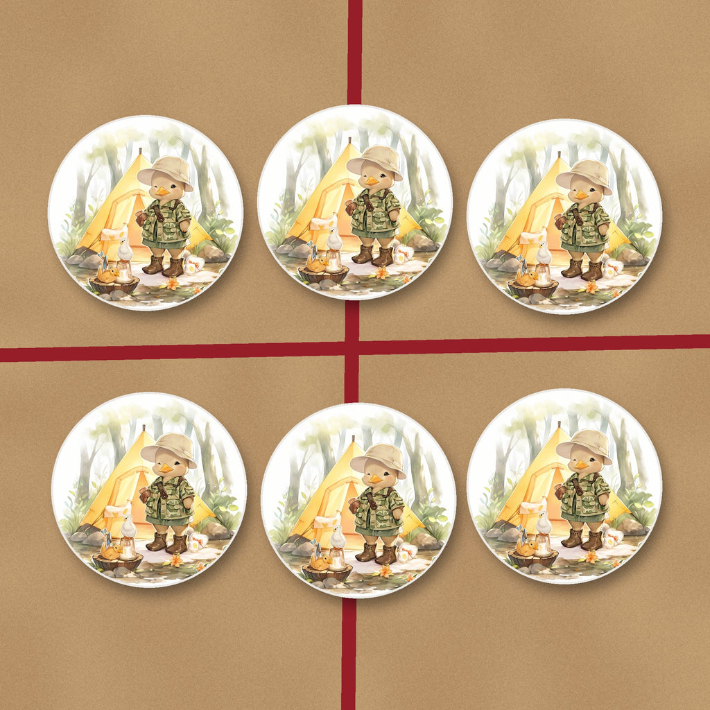 Duckling Camper round ceramic coasters on kraft gift wrap