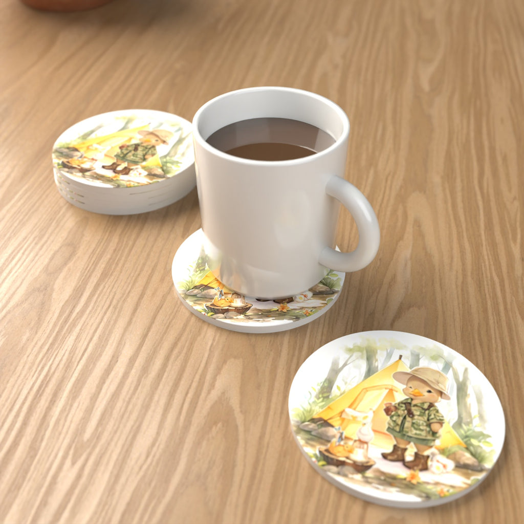 Duckling Camper Round Ceramic Coasters – Set of 6 – lifestyle mockup with a mug of coffee